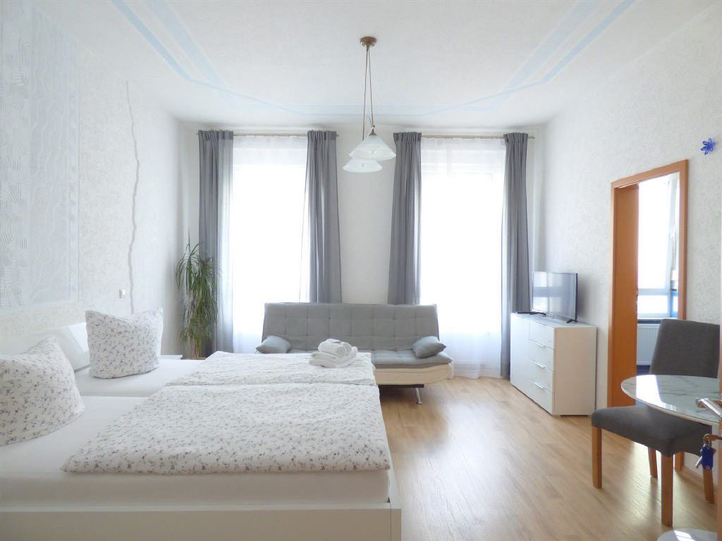 Sehr gepflegtes Wohn-/ und Geschäftshaus im Zentrum von Baden-Baden — Apartment-V
